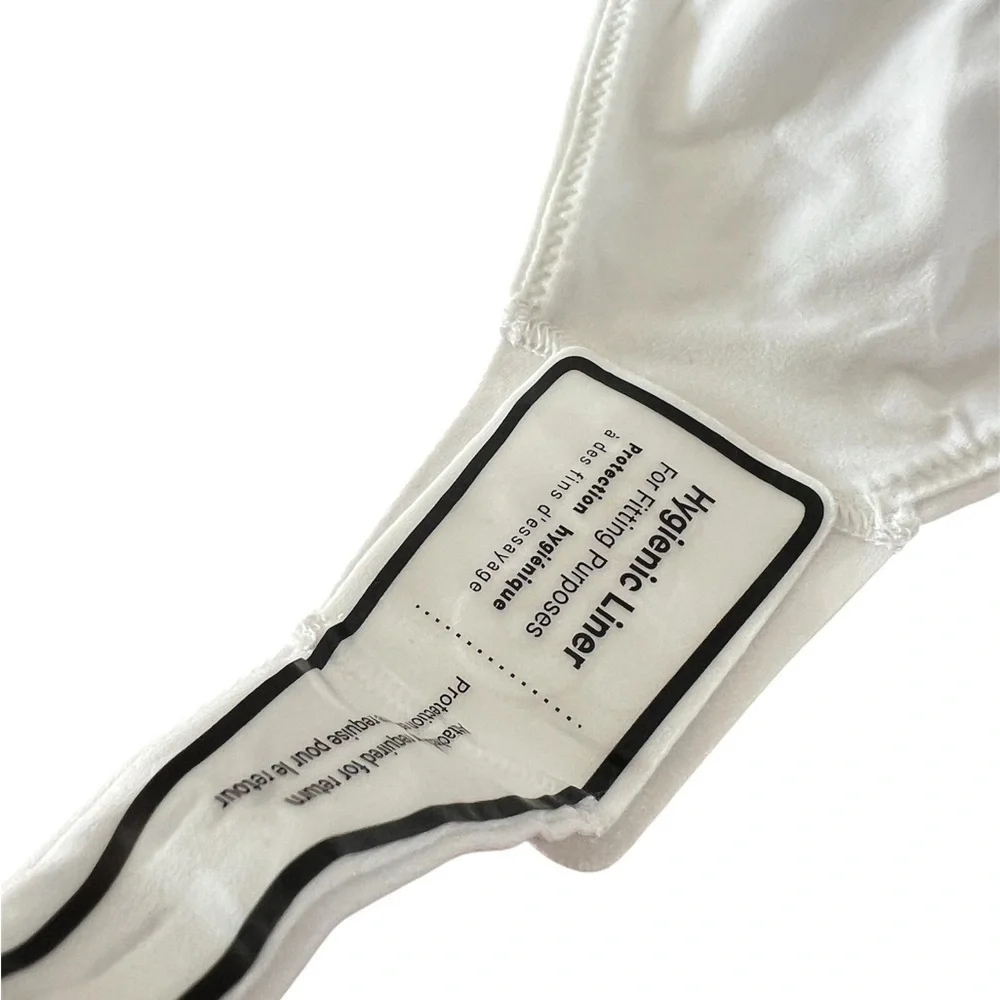 Lululemon Athletica White Fitted Bodysuit Top
